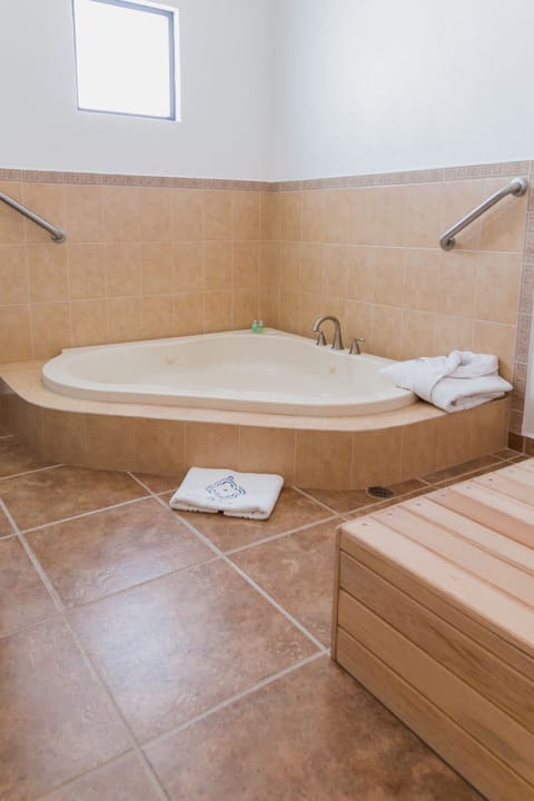 Hot tub, steam room, hot stone massages, deep-tissue massages