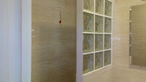 Double Room | Bathroom | Shower, free toiletries, towels