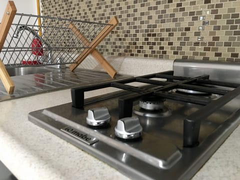 City Apartment, Kitchen | Private kitchenette | Fridge, microwave, stovetop, coffee/tea maker