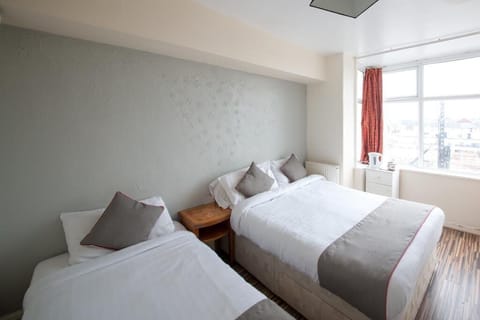 Standard Triple Room, Private Bathroom | Free WiFi, bed sheets