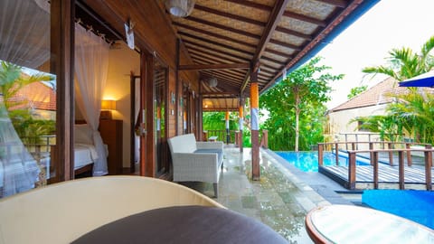 Family Room, 2 Bedrooms, Pool View | Terrace/patio