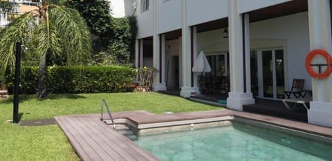Outdoor pool, pool umbrellas, sun loungers