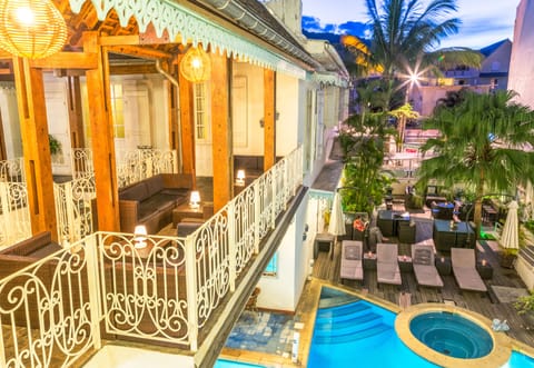 Outdoor pool, open 7:00 AM to 10:00 PM, pool umbrellas, sun loungers