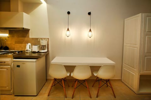 Studio, Balcony, Mezzanine (Aphrodite) | Private kitchen | Fridge, stovetop, coffee/tea maker, electric kettle