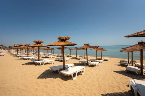 Private beach nearby, sun loungers, beach umbrellas, beach bar
