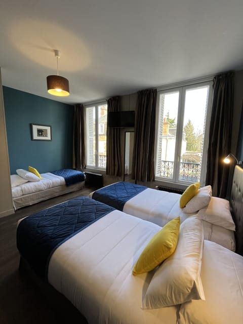 Family Triple Room | 1 bedroom, premium bedding, in-room safe, individually decorated