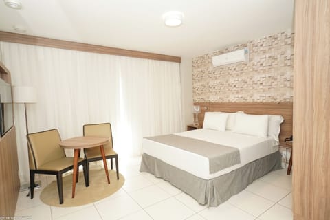 Deluxe Double Room, 1 Double Bed, Patio, City View | Minibar, in-room safe, desk, blackout drapes