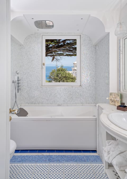 Deluxe Double or Twin Room, Jetted Tub, Sea View | Minibar, in-room safe, desk, soundproofing