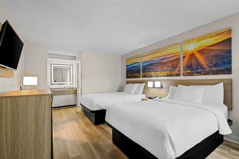 Desk, iron/ironing board, free cribs/infant beds, rollaway beds