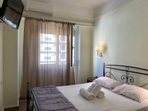 Desk, free WiFi, bed sheets