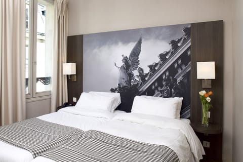 In-room safe, desk, WiFi (free), bed sheets