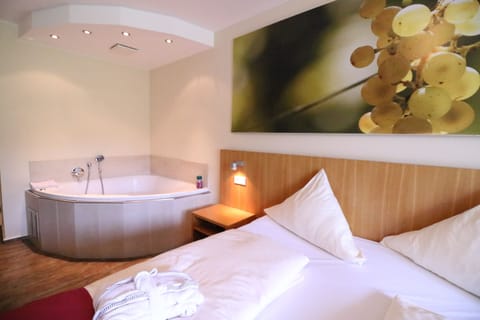 Hypo-allergenic bedding, minibar, in-room safe, desk