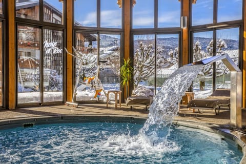 Indoor pool, seasonal outdoor pool, pool umbrellas, sun loungers