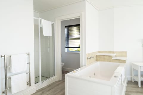 Sea View Room - Open plan bathroom (1) | Bathroom | Shower, hair dryer, towels, soap