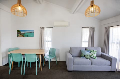 Classic Two Bedroom Motel Sleeps 5 | Living area | Books