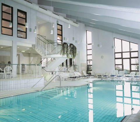 Indoor pool, open 7:00 AM to 11:00 PM, sun loungers