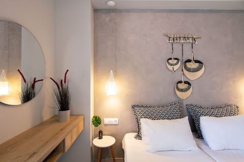 Apartment, 1 Bedroom, Sea View | 1 bedroom, desk, iron/ironing board, free cribs/infant beds