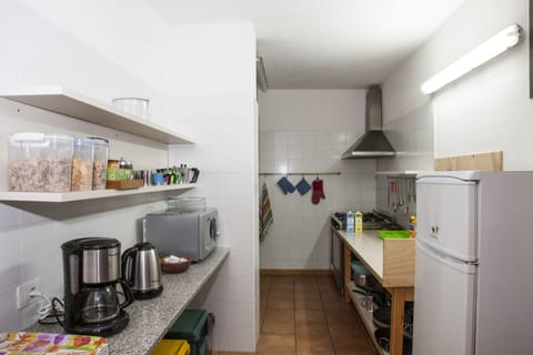 Fridge, stovetop, coffee/tea maker, cookware/dishes/utensils