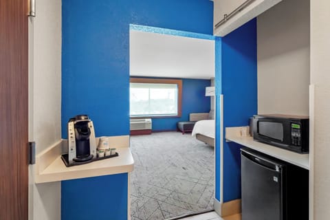 Desk, blackout drapes, iron/ironing board, cribs/infant beds