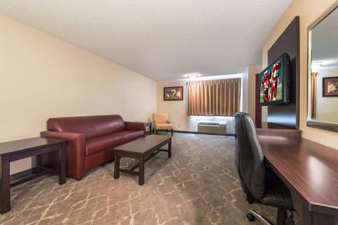 Suite, 1 King Bed with Sofa bed (Smoke Free) | Blackout drapes, iron/ironing board, free WiFi, bed sheets