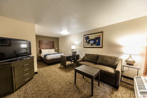 Standard Suite, 1 King Bed | Desk, iron/ironing board, free WiFi, bed sheets