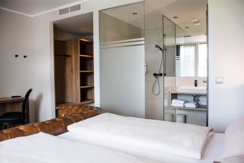 Shower, free toiletries, hair dryer, towels