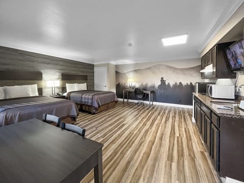 Standard Room, 2 Queen Beds, Kitchen | Desk, laptop workspace, blackout drapes, iron/ironing board