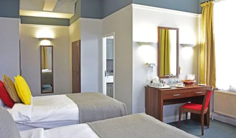 Standard Triple Room | In-room safe, desk, blackout drapes, iron/ironing board