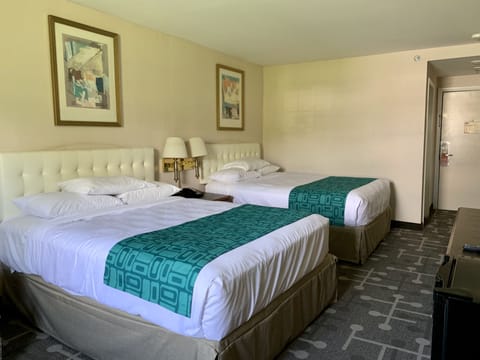 Room, 2 Queen Beds, Non Smoking | Desk, iron/ironing board, free cribs/infant beds, free rollaway beds