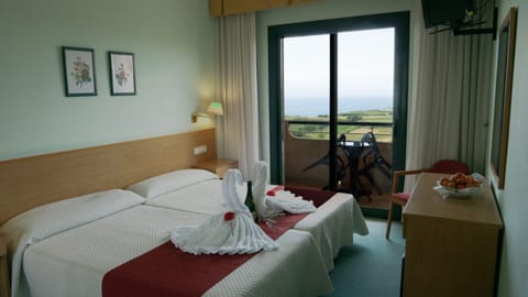 Standard Room, 2 Twin Beds, Sea View | In-room safe, desk, laptop workspace, blackout drapes