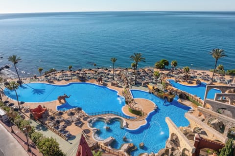 Indoor pool, outdoor pool, pool umbrellas, sun loungers
