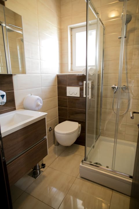 Triple Room, Balcony, Sea View | Bathroom | Shower, hydromassage showerhead, free toiletries, hair dryer