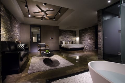 Premium Suite | Minibar, in-room safe, individually decorated, individually furnished