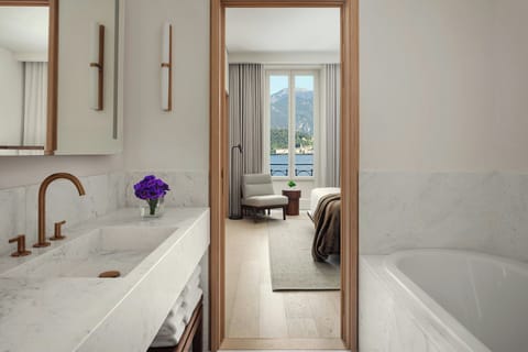 Designer toiletries, hair dryer, bathrobes, slippers