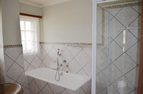Basic Room, Mountain View | Bathroom | Combined shower/tub, free toiletries, hair dryer, towels