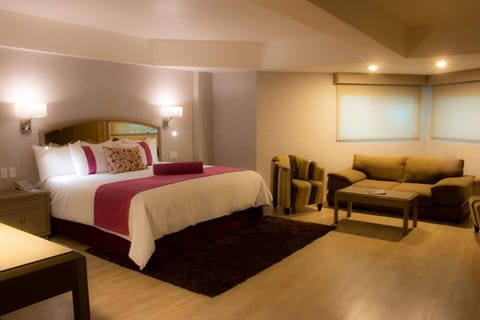 Junior Suite | 1 bedroom, in-room safe, desk, iron/ironing board