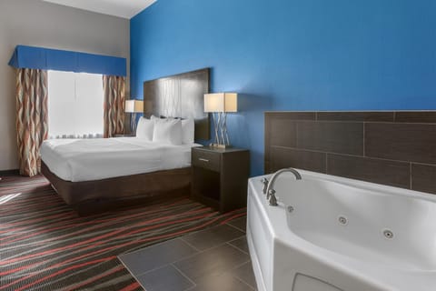 Suite, 1 King Bed, Non Smoking, Jetted Tub | 1 bedroom, premium bedding, pillowtop beds, in-room safe