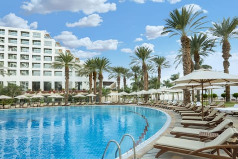 Indoor pool, outdoor pool, pool umbrellas, sun loungers
