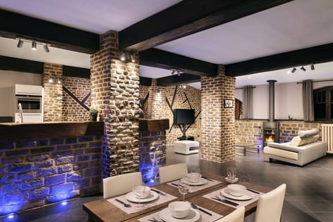 Deluxe Penthouse, 2 Bedrooms, Terrace | Living area | 50-inch flat-screen TV with cable channels, plasma TV
