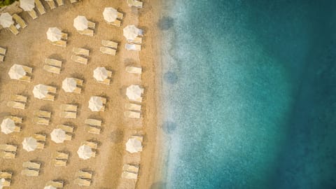 Beach nearby, sun loungers, beach umbrellas, motor boating