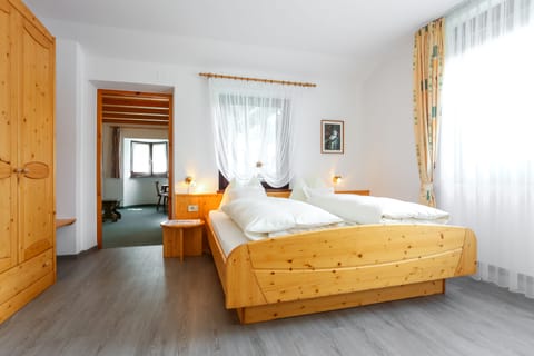 Quadruple Room, Balcony, Garden View | Premium bedding, in-room safe, desk, laptop workspace