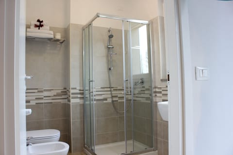 Shower, free toiletries, hair dryer, towels