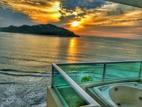 Deluxe Suite, Hot Tub, Sea View | In-room safe, laptop workspace, iron/ironing board, bed sheets