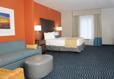 Deluxe Suite, 1 King Bed (The Lodge) | Premium bedding, pillowtop beds, blackout drapes, iron/ironing board