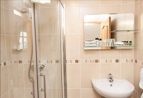 Shower, hair dryer, bathrobes, towels