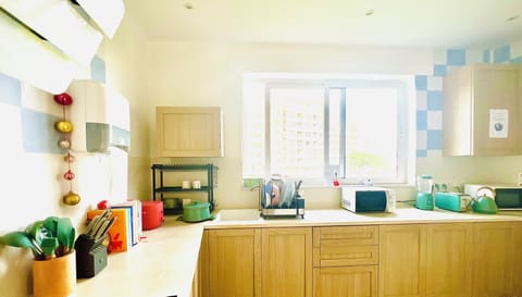 Fridge, microwave, cookware/dishes/utensils