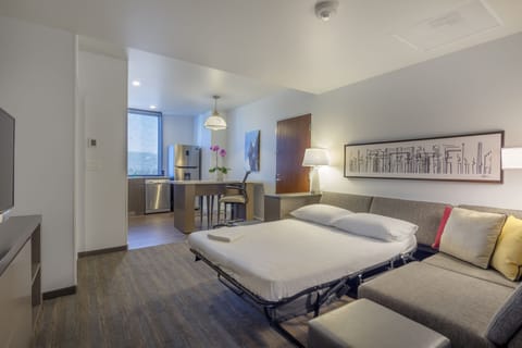 Premium bedding, down comforters, in-room safe, desk