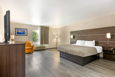 Suite, 1 King Bed, Accessible, Smoking | Desk, blackout drapes, iron/ironing board, free WiFi