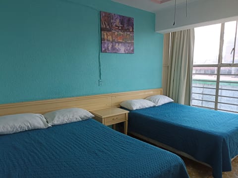 Quadruple Room | In-room safe, desk, free WiFi, bed sheets