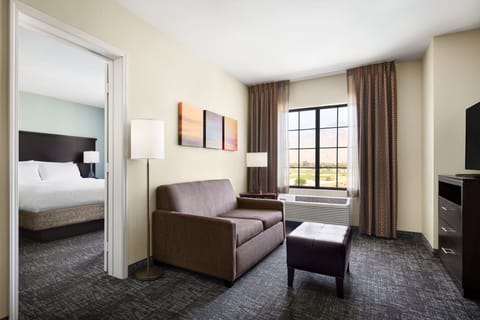 Premium bedding, down comforters, in-room safe, desk